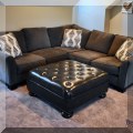 F10. Jonathan Louis sectional. 28"h x 94"w x 94"d 